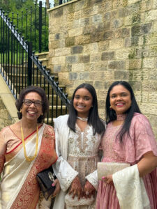 Kaushy, Maitri and Minal Patel of Prashad, wearing traditional Indian outfits
