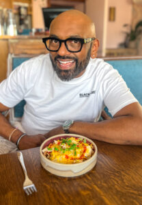 Prashad owner Bobby with the famous chaat dish